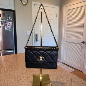 CHANEL Black Quilted Leather Clutch
